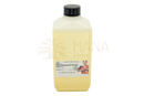 A clear plastic bottle of midgard kalari ayurveda massageöl karpuradi keram with pale yellow liquid and traditional label