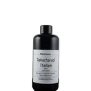 Schwarze glasflasche sahacharadi thailam ayurveda massageöl von midgard kalari traditionelle ölblendung
