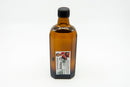Flasche mit Midgard Kalari Ayurvedisches Jojoba Öl in einer Massageöl-Flasche, ideal für natürliche Pflege und Massage.