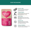Rosa und beige herzförmige tasche mit frauenspezifischem veganem multivitamin und mineral für bedürfnisse von frauen