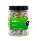 Ein klares glas mit schwarzem deckel enthält 200 beige pflanzenkapseln musta bio kapseln von cosmovita für verdauung und energie im mana shop ayurveda specialist
