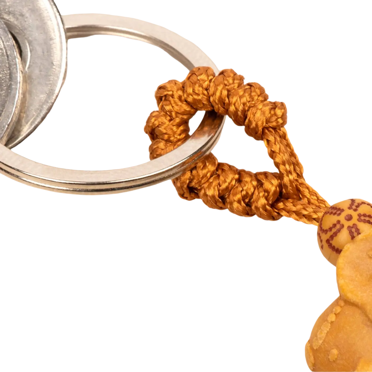Goldener, geflochtener Schlüsselanhänger von Myga Eco aus Schmuckmaterial, stilvoll und umweltfreundlich gestaltet.