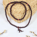 Mallah Meditations-Perle Mala Gebetskette von Myga Eco, aus natürlichen Perlen, mit meditativen Schmuckelementen, auf weißem Hintergrund