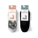 Rückenfreie schwarze Yoga-Socken mit Kreuzriemen und rutschfesten Griffen von Myga Eco, geeignet für Yogaübungen.
