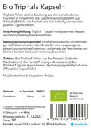 Ein deutsches Produktetikett für Bio-Triphala-Kapseln mit Angaben zur Kräutermischung, Verzehrempfehlung, Nährwerten und Bio-Zertifizierung.