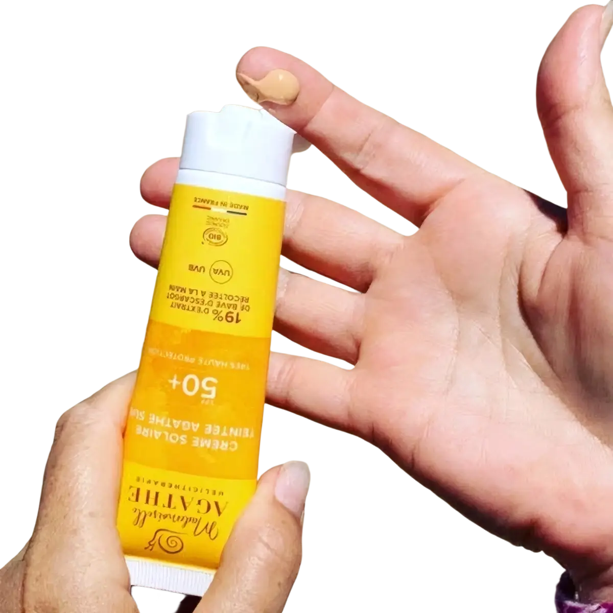 Natürliche Bio Sonnencreme für das Gesicht mit getönter Textur und SPF50+ von Mademoiselle Agathe, zeigt die Verpackung und Konsistenz