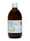 Braune glasflasche mit weißem schraubverschluss und ayurveda label mit organischen zertifikaten für neemöl naturpflegeöl für muskeln und gelenke