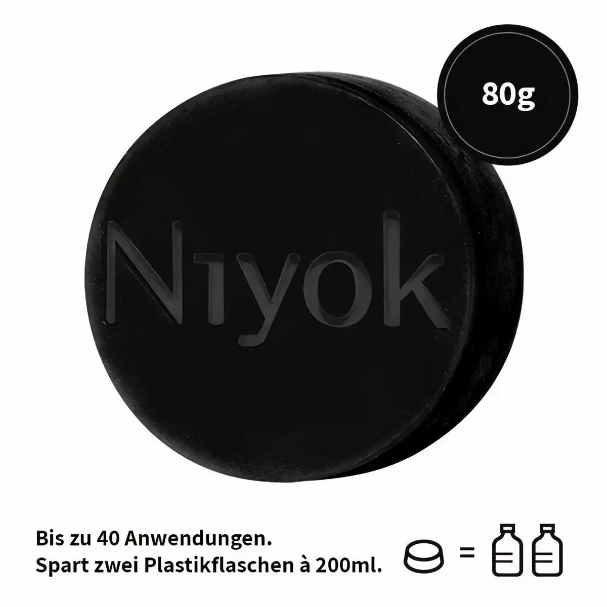 Niyok feste Gesichtsreinigung mit Patchouli, 80g, zeigt ein schwarzes, rundes Gesichtspflegeprodukt in der Abbildung.
