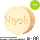 Feste Dusche & Pflege von Niyok, 80 g, Körperpflegeprodukt mit natürlicher Textur und pflegender Wirkung.