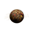 A runde metallische dose mit paavani ayurveda bliss blend tridosha-tee aus bunten getrockneten kräutern für emotionale balance