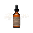 Bernsteinfarbene paavani ayurveda glasflasche mit schwarzem tropfverschluss und botanischer feuchtigkeitspflege für haut und augen mit rose und lavendel