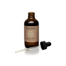 Flasche mit Kräuter-Haaröl von PAAVANI Ayurveda, ayurvedische Kopfhaut- und Haarbehandlung, naturbelassenes Haaröl.