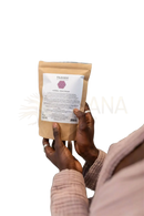 Beige wiederverschließbarer paavani ayurveda kräuter yoni steam pouch mit weißem etikett und lila lotuslogo für dampfbad