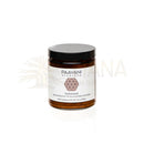 Ein schlankes bernsteinfarbenes glas mit schwarzem deckel von paavani ayurveda ayurvedisches kraut gegen stress und hormonelles gleichgewicht