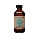 PAAVANI Ayurveda Mundölziehen mit Öl für Mundgesundheit und Entgiftung, zeigt ein Glas mit Öl und Zähne im Hintergrund