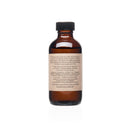 PAAVANI Ayurveda Mundölziehen mit Ölziehen für Mundgesundheit und Entgiftung, zeigt eine offene Flasche mit Öl für die Mundpflege