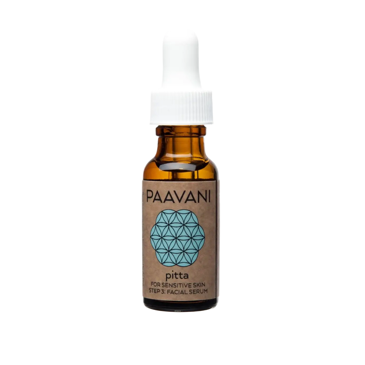 Kleine bernsteinfarbene glasflasche mit weißem tropfverschluss und braunem etikett paavani ayurveda pitta serum für empfindliche haut ayurvedisches gesichtsöl