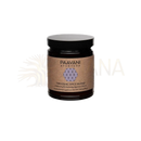 Ein dunkles bernsteinfarbenes glas mit schwarzem deckel und braunem paavani ayurveda etikettt tridoshic spice blend fördert nährstoffaufnahme