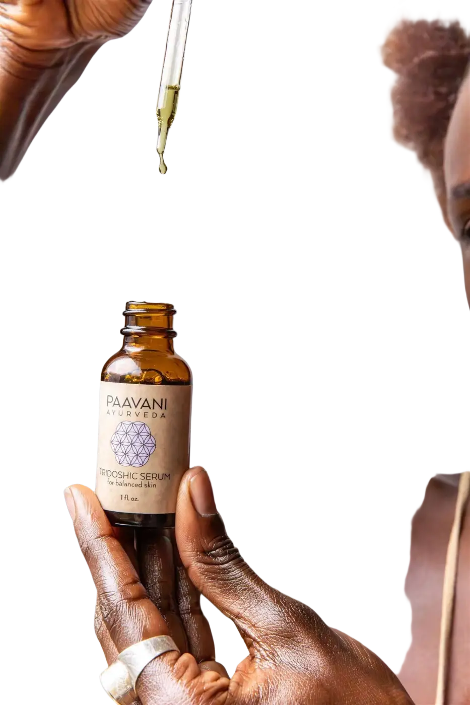 PAAVANI Ayurveda Tridosha Serum, ayurvedisches Gesichtsöl für ausgeglichene Haut, flüssige Textur in dunkler Glasflasche