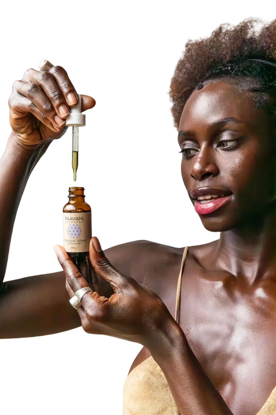 PAAVANI Ayurveda Tridosha Serum, ayurvedisches Gesichtsöl für ausgeglichene Haut, in einer braunen Glasflasche mit Pumpverschluss