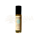 Ein schwarz-gekappter roll-on-flakon paavani ayurveda spannungslösungsöl mit beigem etikett und goldenem öl zur entspannung