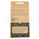 Die rückseite einer braunen papiertüte mit schwarzen ornamenten und text zu palo santo holz für spirituelle reinigung