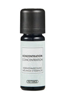 Ein elegantes schwarzes glasfläschchen mit matter schwarzer kappe und hellblauem label phytomed konzentration essenzenmischung 10ml