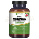 Eine braune glasflasche mit schwarzem verschluss und label pure moringa organic certified von prowise healthcare für vegane kapseln