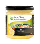 Ein glas cosmoveda bio reines ghee mit schwarzem deckel und grünen akzenten für milde currypaste und indisches curry