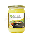 A glas jar with golden-yellow bio reines ghee by cosmoveda for cooking indian curry and mild curry paste