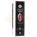 Ein einzelner dunkelvioletter räucherwerk tarot edelsteine rosenquarz wildrose räucherstab neben schwarzer und rosa verpackung mit rosenquarz design