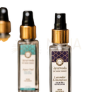 Klarer glasflakon mit goldfarbiger sprühdüse und schwarzem deckel raumspray lavendel lemongrass room spray song of india