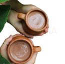 Earthenware clay mugs with rustic handcrafted handles in warm terracotta color for reine kakaobutter by anahata cacao from mana shop