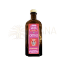 Ein braunes glasfläschchen mit goldverschluss und rosa etikett klassik ayurveda massageöl rhyner murivenna ortho traditionelles kerala kräuteröl