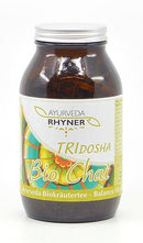 Ayurveda Rhyner Tridosha Chai Bio-Tee 70g mit kraftvollen Kräutern, entgiftend und erwärmend, in einer Teeschachtel.