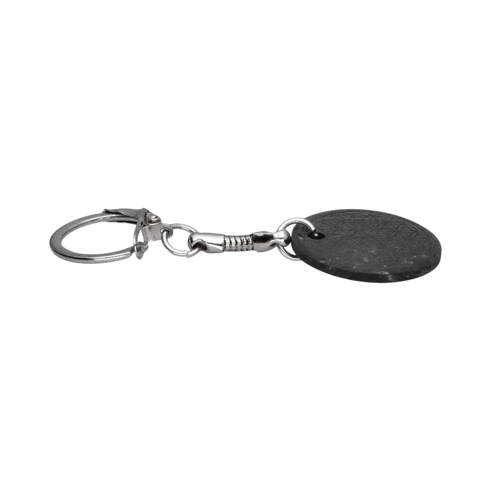 Schlüsselanhänger aus Schungit in Lebensbaum-Form, handgefertigter Schmuck von Vives de la Cortada S.L, zeigt detaillierte Baumstruktur