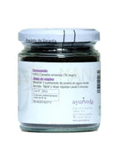 Ein klarer glasbehälter mit weißem deckel und etikett enthält dunkle schwarze tee-blätter schwarzer tee 100 g mana shop ayurveda auténtico typical ayurvedic