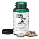 Grüne glasflasche siberiangreen shilajit und chaga kapseln mit schwarzem deckel und verstreuten chaga capsules im mana shop