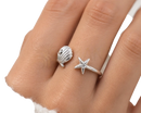 Silberring muschel seestern in 925 sterling silber mit maritimem design und eleganten offenen ringbändern gr 54