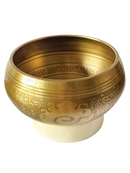 Goldene tibetische klangschale 10 cm mit eingraviertem sanskrit und spiralmustern auf hellholzsockel