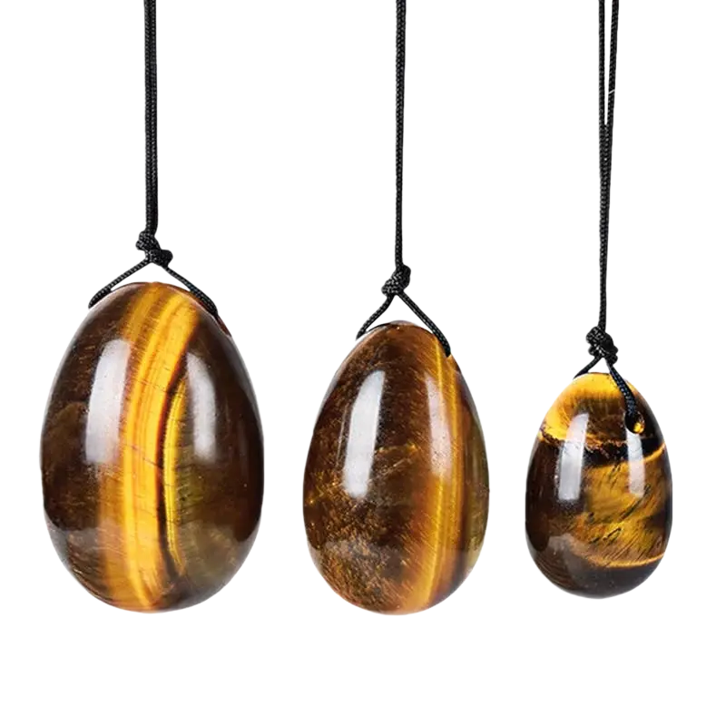 Tigerauge Yoni-Ei, gebohrt, 30x20 mm, aus Madagascar, handgefertigt von Artisans de Madagascar, detailreiche Oberfläche sichtbar