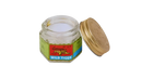 Kleines sechseckiges glas mit goldfarbenem deckel und tiger illustration label von glamza tiger balm fördert die durchblutung mit ätherischen ölen