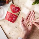 Vegane Multivitamin-Nahrungsergänzung von Together Health in 30 Kapseln, zeigt die Verpackung und die Kapseln.