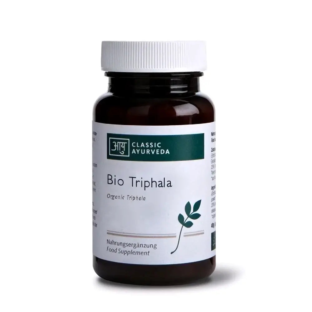Dunkelbraune Bio-Kapseln von Classic Ayurveda Triphala in einer Packung, 60g, als ayurvedisches Kombinationspräparat.