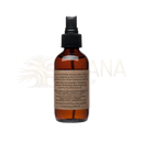Amber glas sprühflasche mit schwarzer düse und label des vata aromatherapie spritzers ayurvedisches spray zur erdung