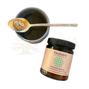 A paavani ayurveda vata spice blend jar with black lid and beige label with green design containing hydrating digestive churna