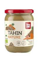 Ein glas mit beige tahin paste und rotem deckel, lima tahin sel marin 500g zur veganen verwendung