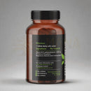Braune glasflasche mit schwarzem deckel und dunkelgrünem etikett vitamin b12 kapseln zur unterstützung von müdigkeit und gehirnfunktion