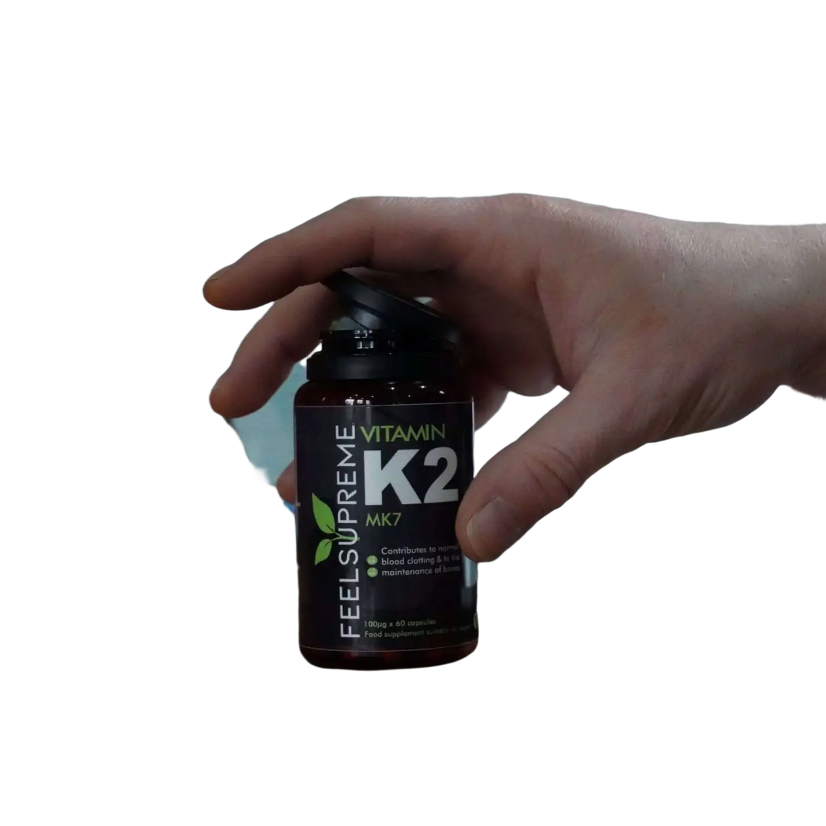 Vitamin K2 MK7 Nahrungsergänzung von Feel Supreme in Bioaktiver Form, Flasche mit Kapseln, gesundheitsfördernd.