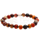 A stretchy dream achat armband with polished amber agate beads and a clear crystal accent by vives de la cortada